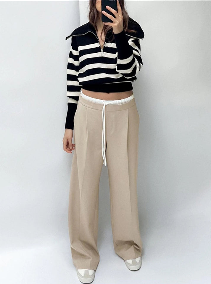 Pantalon beige élégant, coupe ample et droite